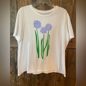 Elegant White Tee with Purple Floral Design